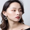 Dingxin Jewelry Earrings 9120017, a popular new product in foreign trade, offers fashionable metal earrings with a European and American style. Wholesale supply from the manufacturer details Picture